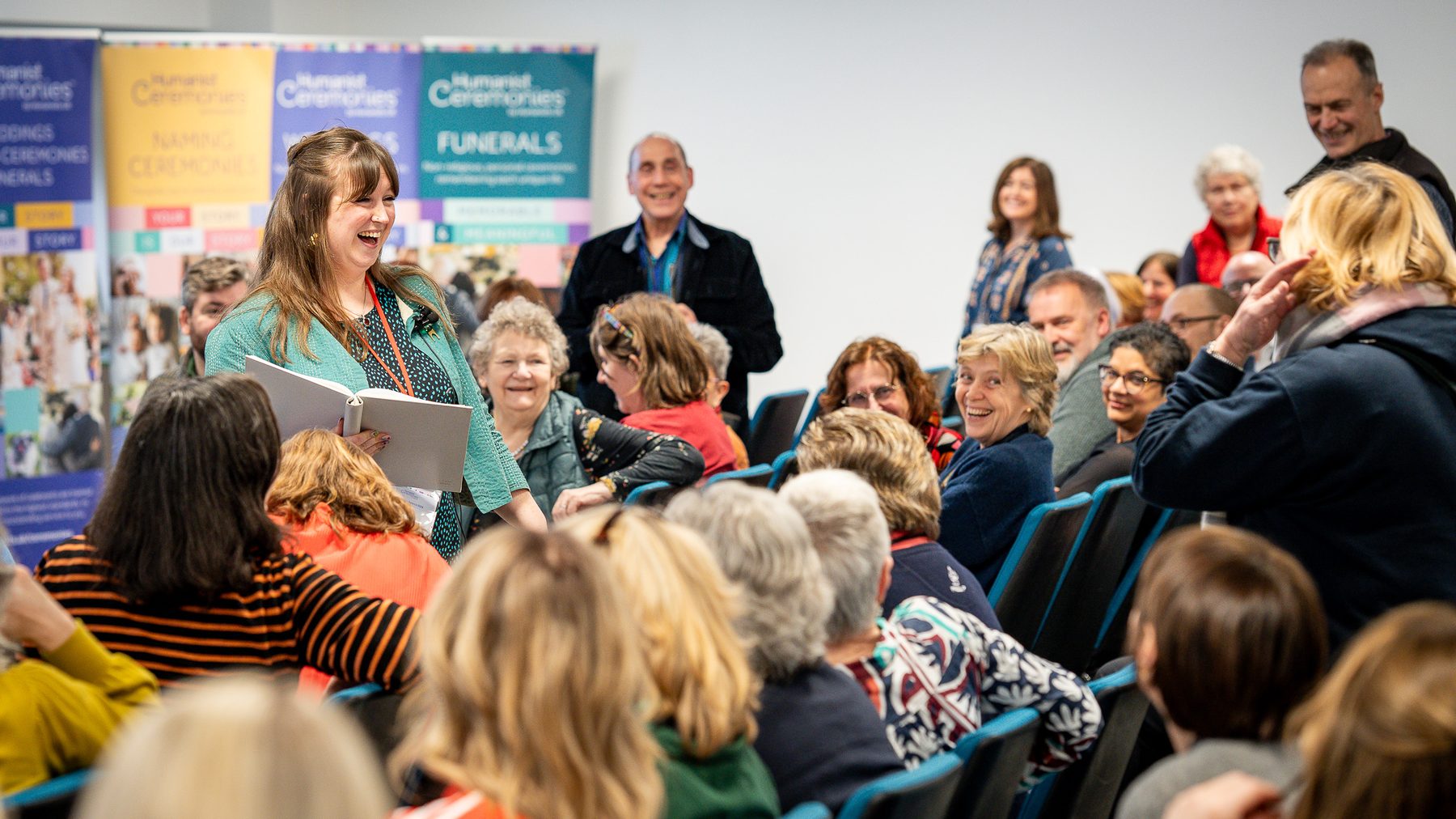 Audience laughing during a talk