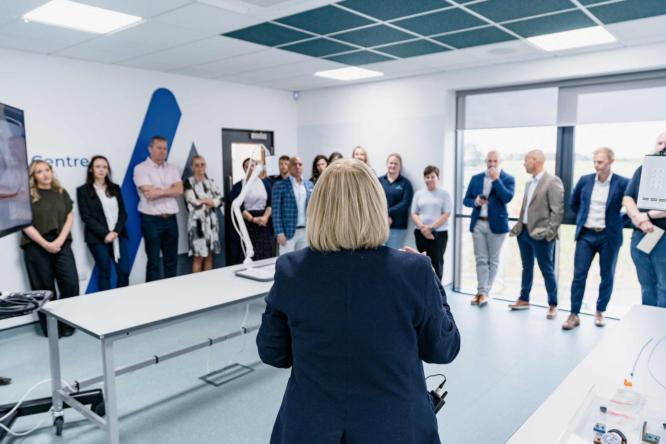 Founder at the door of their business — brand story photography